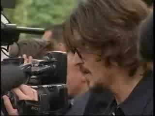 Johnny Depp receiving a french trophee in Paris